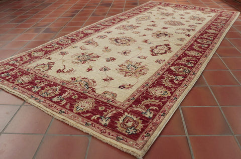 A lovely light coloured Afghan runner ideal for the hall, corridor or landing.