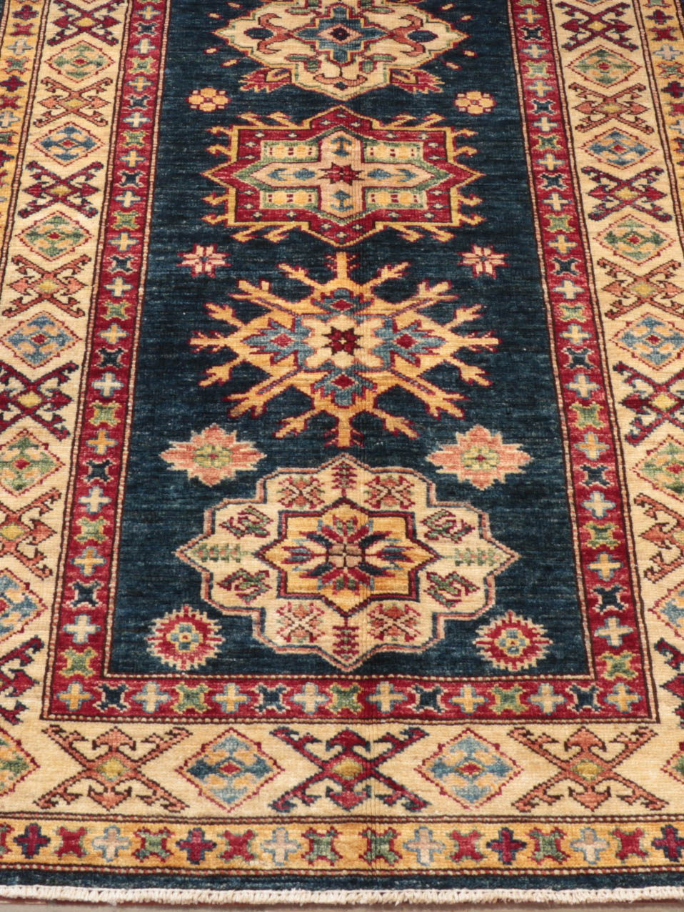 The Caucasian design is very traditional for Kazak rugs