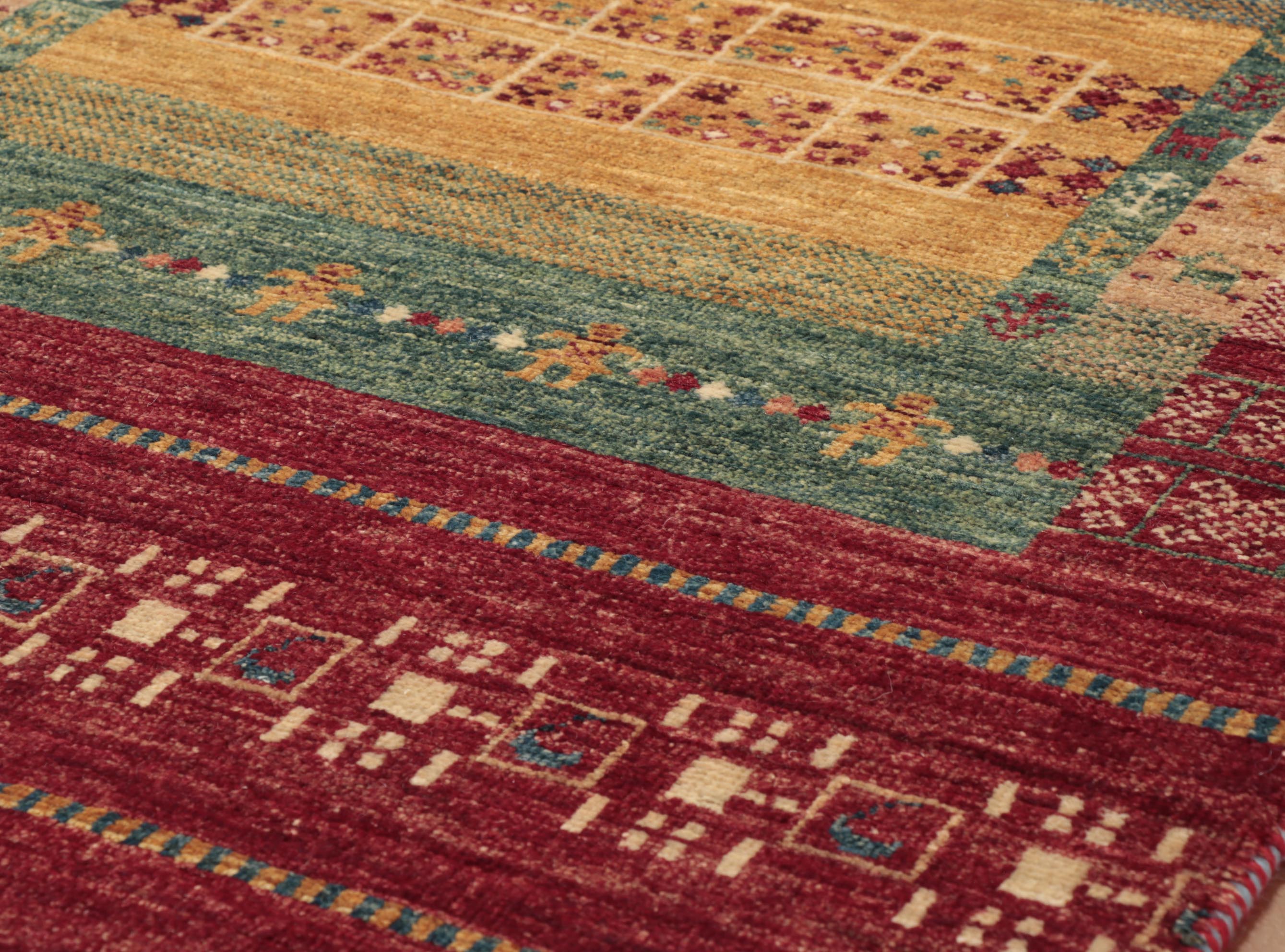 The colours in this Afghan Loribaft are very bright and vibrant, giving off an almost playroom impression