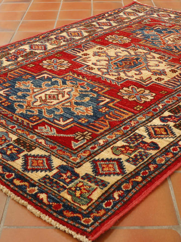 Fine handmade Afghan Kazak rug - 307565