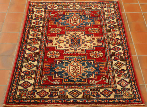 Fine handmade Afghan Kazak rug - 307565