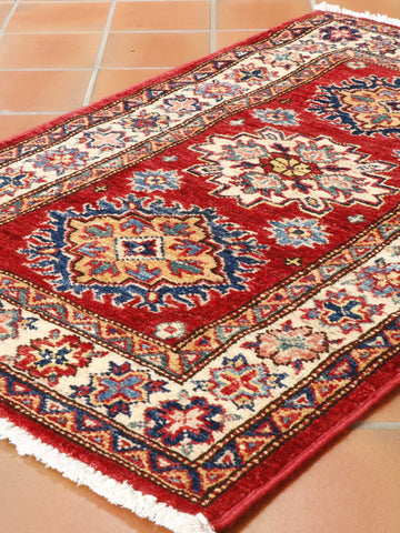 Fine handmade Afghan Kazak rug - 307901